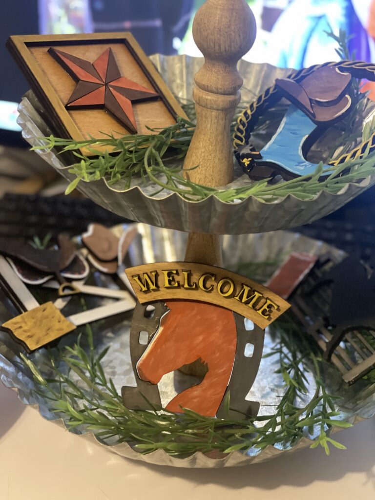 western themed handpainted wooden items horse head, star, cowboy boot and hat, place on two tiered tray for table decor